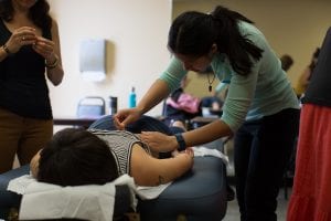acupuncture school student treating patient