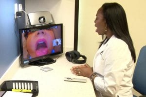 acupuncture physician using telemedicine