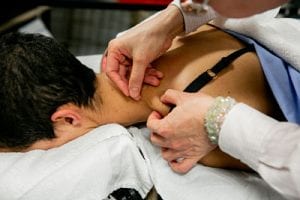 Acupuncture points are found by a professor of acupuncture at Pacific College.