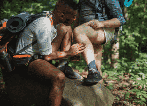 Hikers checking for ticks.