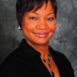 A headshot of Anita R. Hollins