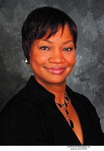 A headshot of Anita R. Hollins