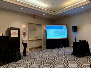 Eloise Theisen speaking at an American Cannabis Nurses Association (ACNA) conference in 2019.