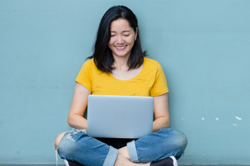 Woman looking at a laptop