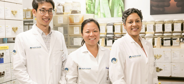 Three people in labcoats