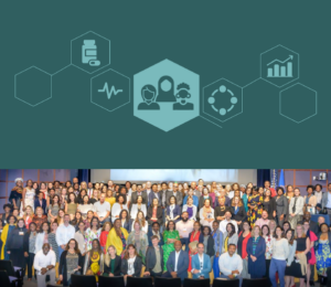 Large group of people on a stage in front of a screen at NIH